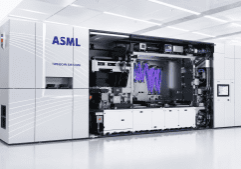 ASML TwinScan EXE5200B lithography system in a bright cleanroom like facility with its side panel opened to reveal internal machinery and wiring
